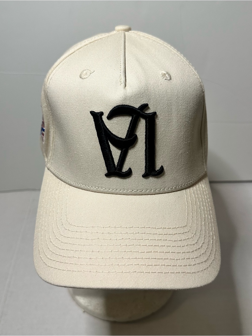 YOUNGLA Cream Baseball Cap with Black Embroidered Logo